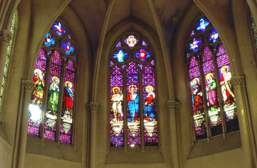 Stained glass window from a chapel with Jesus as central figure-1