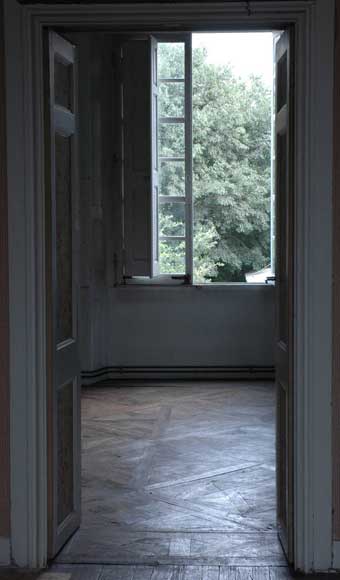 Paneled room and rare parquet flooring from the 18th century-19