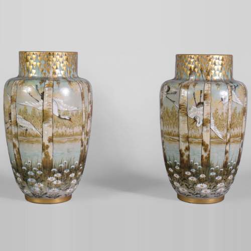 Manufacture KELLER & GUERIN in Luneville - pair of vases decorated with storks in flight in a lake landscape