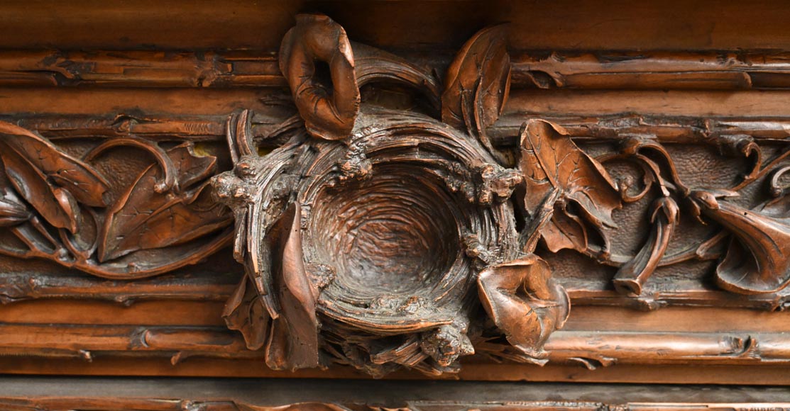 TAHAN (attributed to) — Large carved walnut armoire with mirror and naturalist decoration TAHAN (attributed to) — Large carved walnut armoire with mirror and naturalist decoration-2