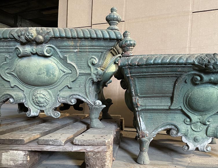 Pair of cast iron planters decorated with cartouches and lion heads-3