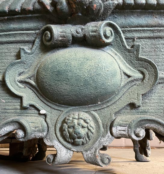 Pair of cast iron planters decorated with cartouches and lion heads-4