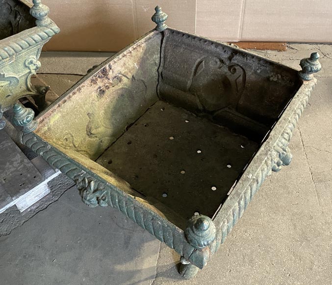 Pair of cast iron planters decorated with cartouches and lion heads-7