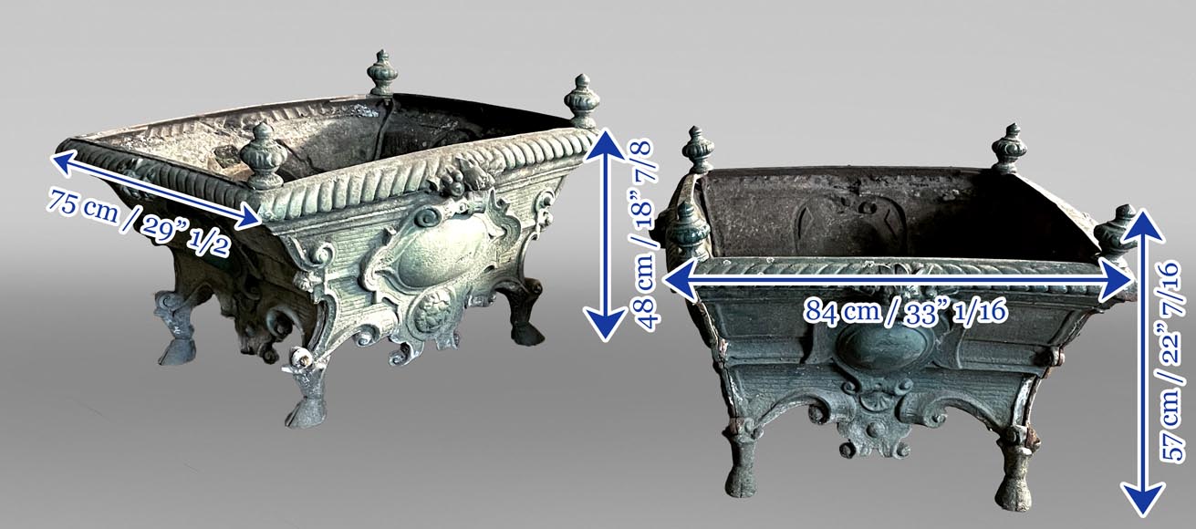 Pair of cast iron planters decorated with cartouches and lion heads-9
