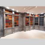 Wood paneled room with trompe l'oeil library decoration, late 20th century