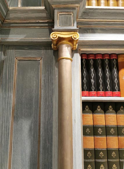 Wood paneled room with trompe l'oeil library decoration, late 20th century-3