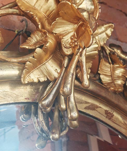 Oval gilt mirror in the Napoleon III style, featuring rich foliate ornamentation-4