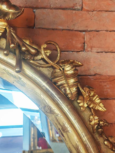 Oval gilt mirror in the Napoleon III style, featuring rich foliate ornamentation-6