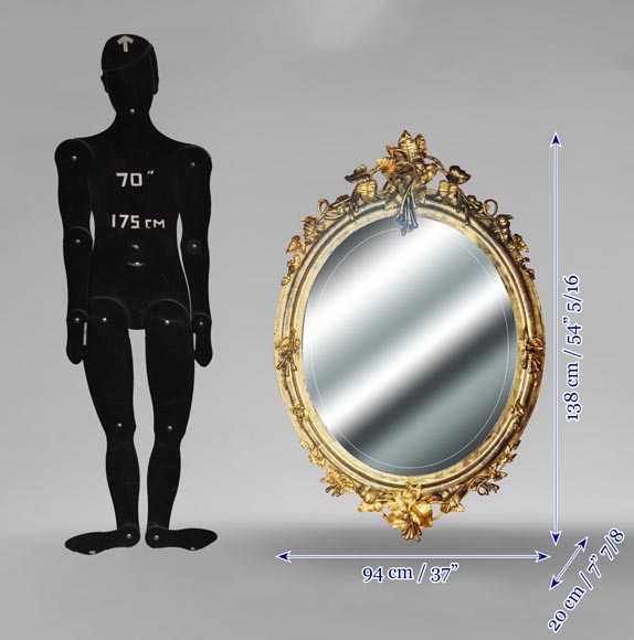 Oval gilt mirror in the Napoleon III style, featuring rich foliate ornamentation-11