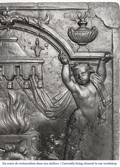 18th-century fireplace plaque with a salamander and two atlantes supporting an entablature with fire vases-8
