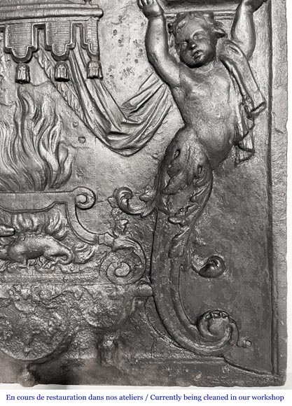 18th-century fireplace plaque with a salamander and two atlantes supporting an entablature with fire vases-10