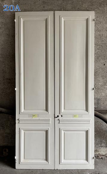 Carved, regilded and white-painted wooden paneling-16
