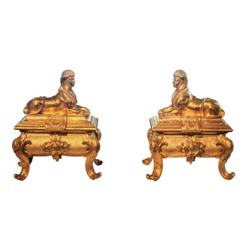 Pair of Napoleon III style gilt-bronze chenets featuring sphinxes