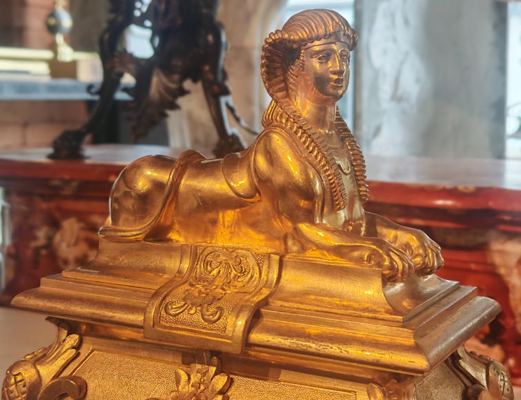 Pair of Napoleon III style gilt-bronze chenets featuring sphinxes-3