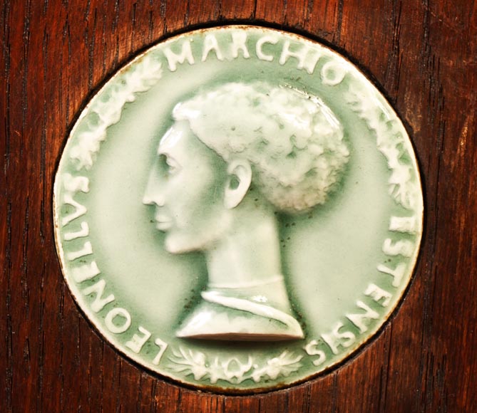 DECK Théodore, monumental oak mirror with green glazed faience medallions-12