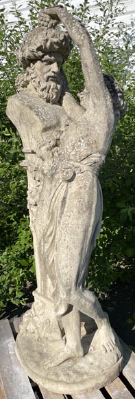 Composite stone garden statue of a woman paying tribute to Baccus, circa 1900-2