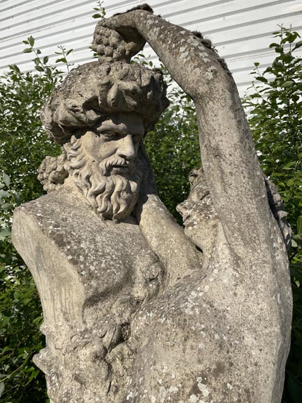 Composite stone garden statue of a woman paying tribute to Baccus, circa 1900-3