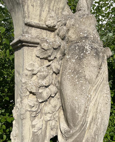 Composite stone garden statue of a woman paying tribute to Baccus, circa 1900-4