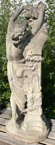 Composite stone garden statue of a woman paying tribute to Baccus, circa 1900-6