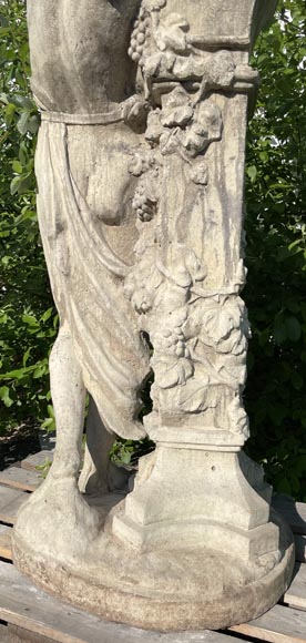 Composite stone garden statue of a woman paying tribute to Baccus, circa 1900-9