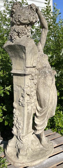 Composite stone garden statue of a woman paying tribute to Baccus, circa 1900-11