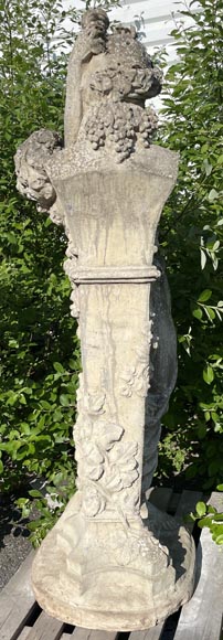 Composite stone garden statue of a woman paying tribute to Baccus, circa 1900-14