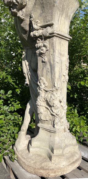 Composite stone garden statue of a woman paying tribute to Baccus, circa 1900-17