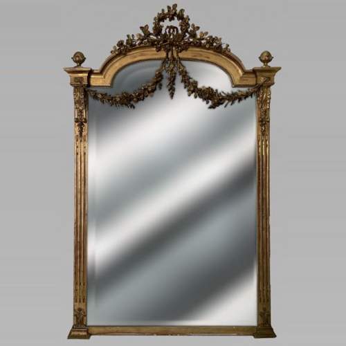 Napoleon III style gilded trumeau with pilasters and flower garlands