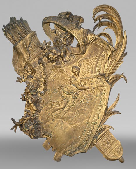 Union Centrale des Arts Décoratifs, decorative gilded bronze plaque in the form of a shield, featuring Winged Victory and trophies of arms-0