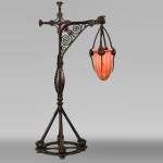 DAUM, Émile ROBERT (attributed to), Lamp in delicately openwork wrought iron and glass, circa 1900