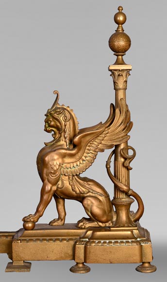 Pair of Egyptian-style gilt-bronze firedogs with confronting griffins-2
