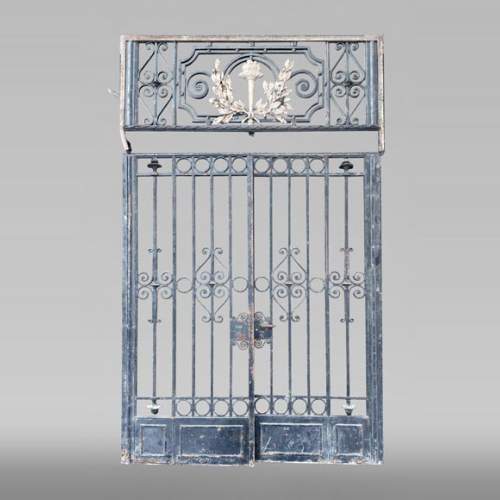 Cast iron double-leaf gate – Louis XVI style decoration with gilded torch