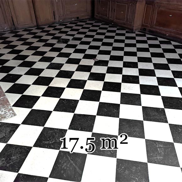 Checkerboard floor in stone and black marble .-0