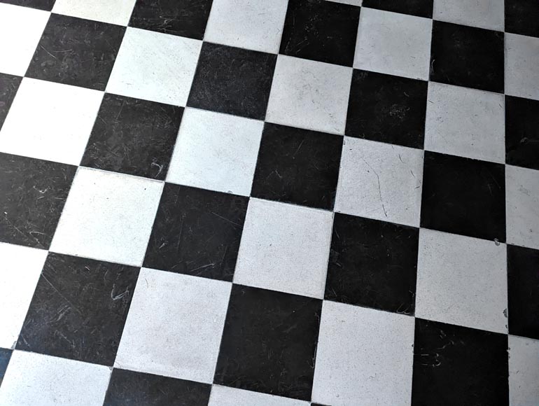 Checkerboard floor in stone and black marble .-1