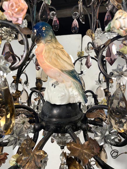 Patinated brass chandelier decorated with flowers and a polychrome porcelain parakeet-1