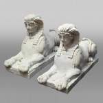 Pair of carved Carrara marble sphinxes
