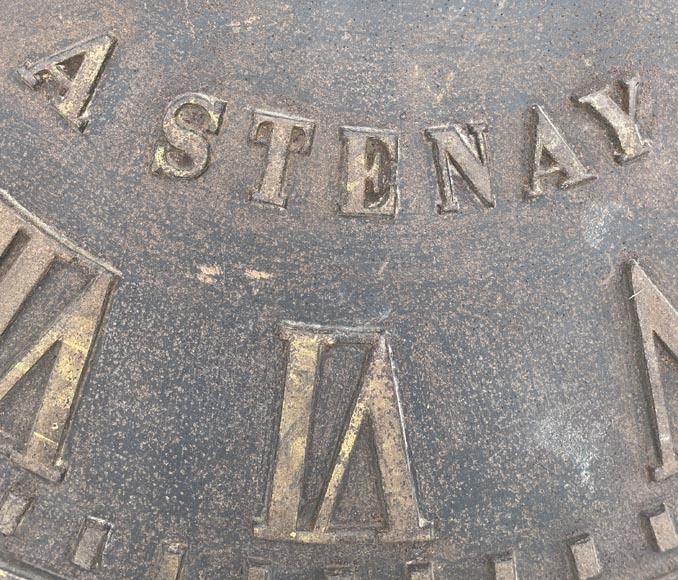 Large cast iron public clock face, with raised Roman numerals, signed 