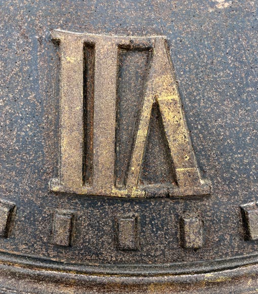 Large cast iron public clock face, with raised Roman numerals, signed 