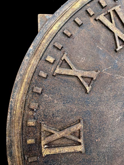 Large cast iron public clock face, with raised Roman numerals, signed 