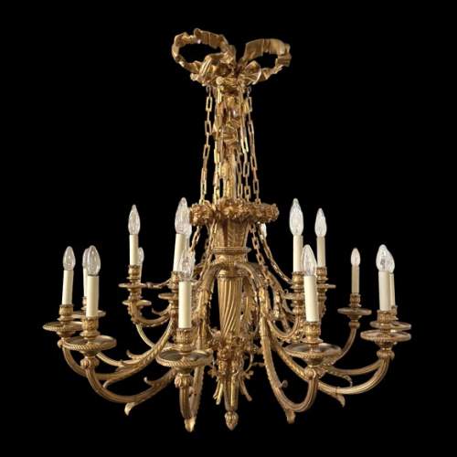 Louis XVI-style gilt-bronze chandelier with eighteen lights, featuring a garland of roses and a ribbon bow