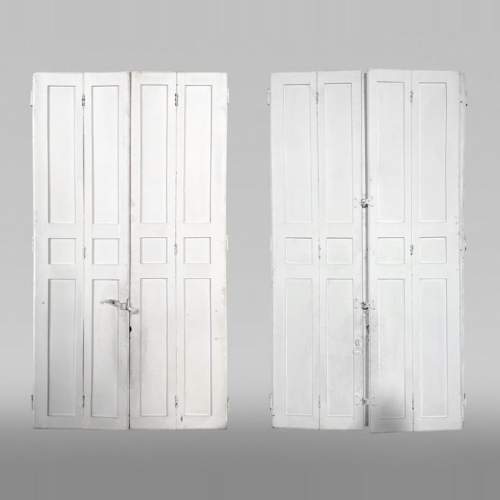 Two pairs of antique oak shutters