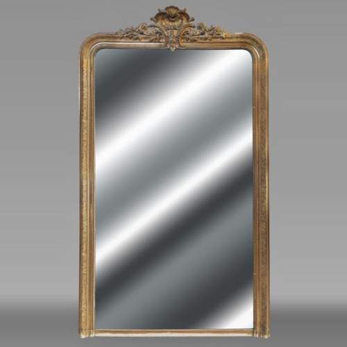 Regency style gilded trumeau, topped with a shell