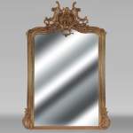 Napoleon III style gilded trumeau topped with a putto