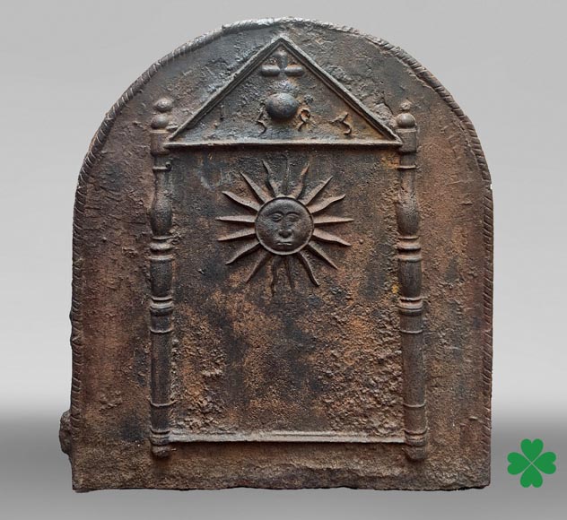 Cast iron fireback dated 1693, decorated with a radiant sun and architectural symbols-0