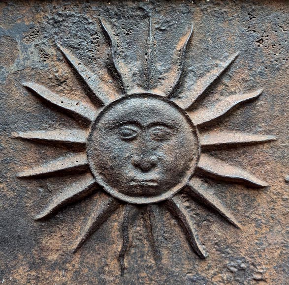 Cast iron fireback dated 1693, decorated with a radiant sun and architectural symbols-3