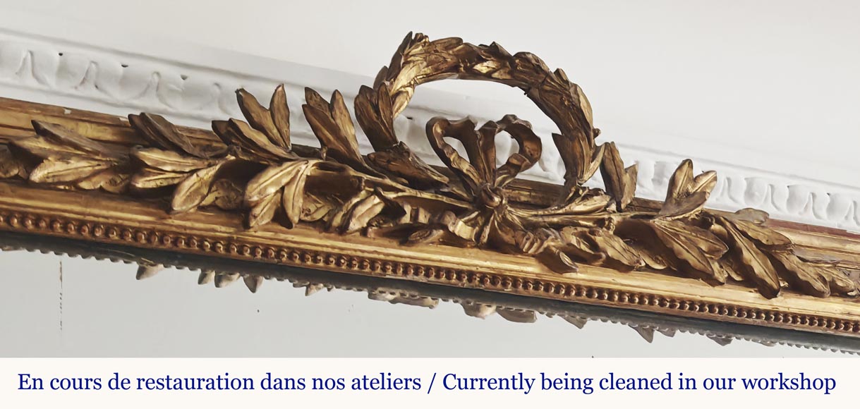 Louis XVI style gilded trumeau, topped with a laurel wreath-2