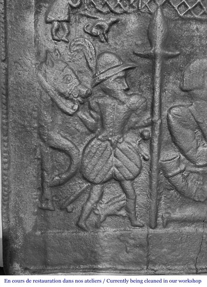 Cast iron fireplace plaque depicting 