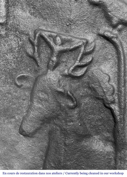 Cast iron fireplace plaque depicting 