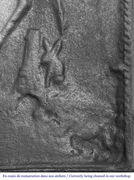 Cast iron fireplace plaque depicting 