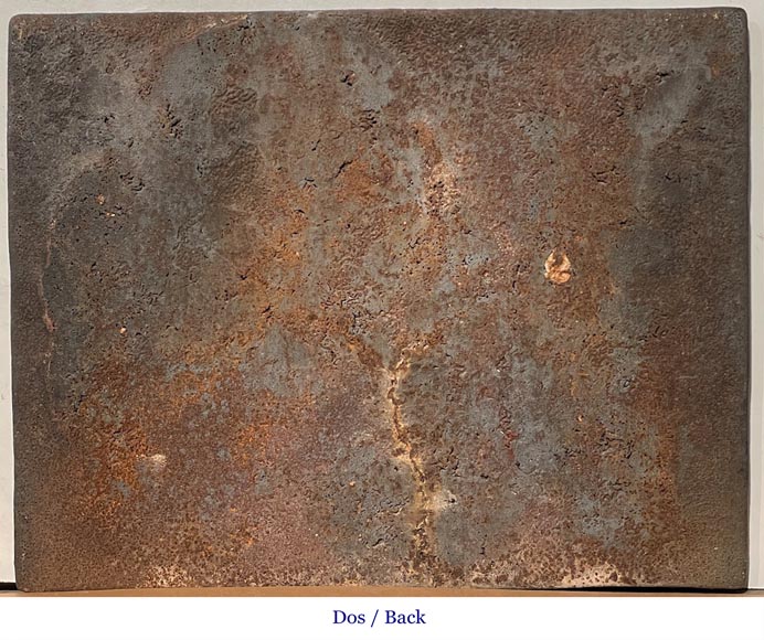 Cast iron fireplace plaque depicting 